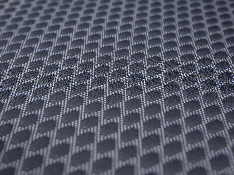 Kain tilam poliester jacquard berkait